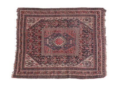 Lot 335 - Khamseh Rug South West Iran, circa 1900 The deep indigo field of stylised plants centred by a panel