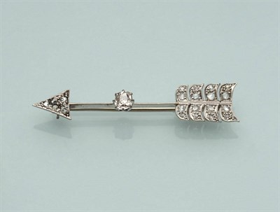 Lot 506 - An Art Deco Diamond Set Arrow Shaped Pin, the arrow head and feather set with rose cut...