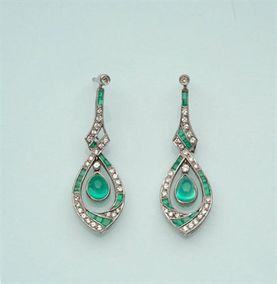 Lot 507 - A Pair of Art Deco Emerald and Diamond Earrings, the drops set with round brilliant cut...