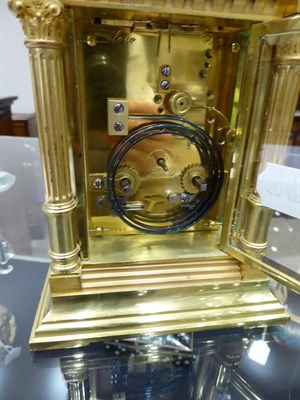 Lot 402 - <> A Brass Striking and Repeating Carriage Clock, circa 1890, carrying handle and repeat...