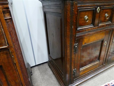 Lot 433 - David Semple: A Reproduction Oak Sideboard, in 17th century style, the moulded top above four...