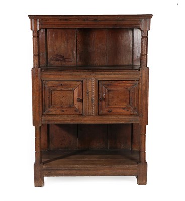 Lot 438 - A Joined Oak Standing Livery Cupboard, early 18th century, the moulded top above chamfered and...