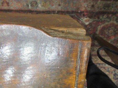 Lot 444 - <> A Late 17th Century Elm Chest, of six plank construction, the moulded hinged lid above an...