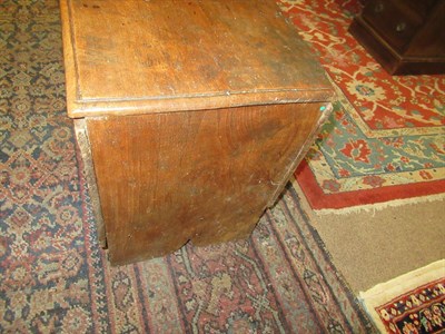 Lot 444 - <> A Late 17th Century Elm Chest, of six plank construction, the moulded hinged lid above an...