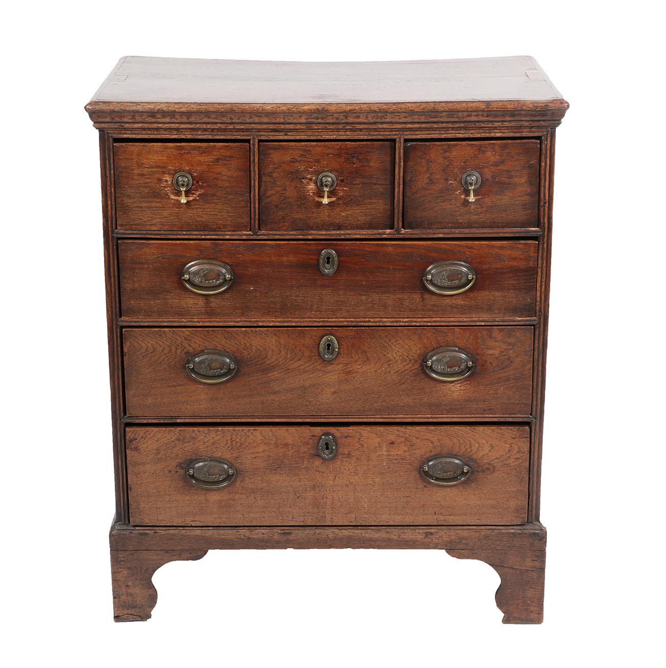 Lot 447 - A George III Oak Straight Front Chest of Drawers, 2nd half 18th century, the moulded top above...