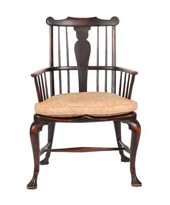 Lot 460 - A Thames Valley Style Ash and Elm Windsor Armchair, the comb shaped top rail above a solid...