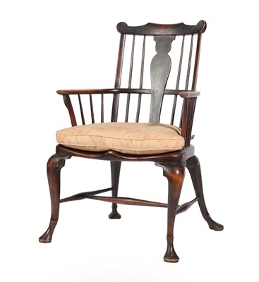 Lot 460 - A Thames Valley Style Ash and Elm Windsor Armchair, the comb shaped top rail above a solid...