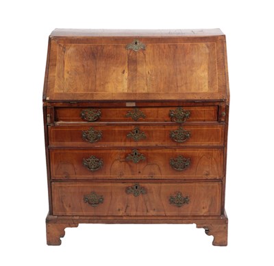 Lot 473 - A George I Walnut, Crossbanded and Boxwood Strung Bureau, early 18th century, the fall...