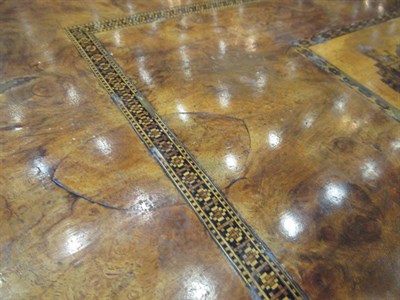 Lot 479 - A Victorian Figured Walnut Work/Games Table, circa 1880, the pivoting top with Tunbridgeware mosaic