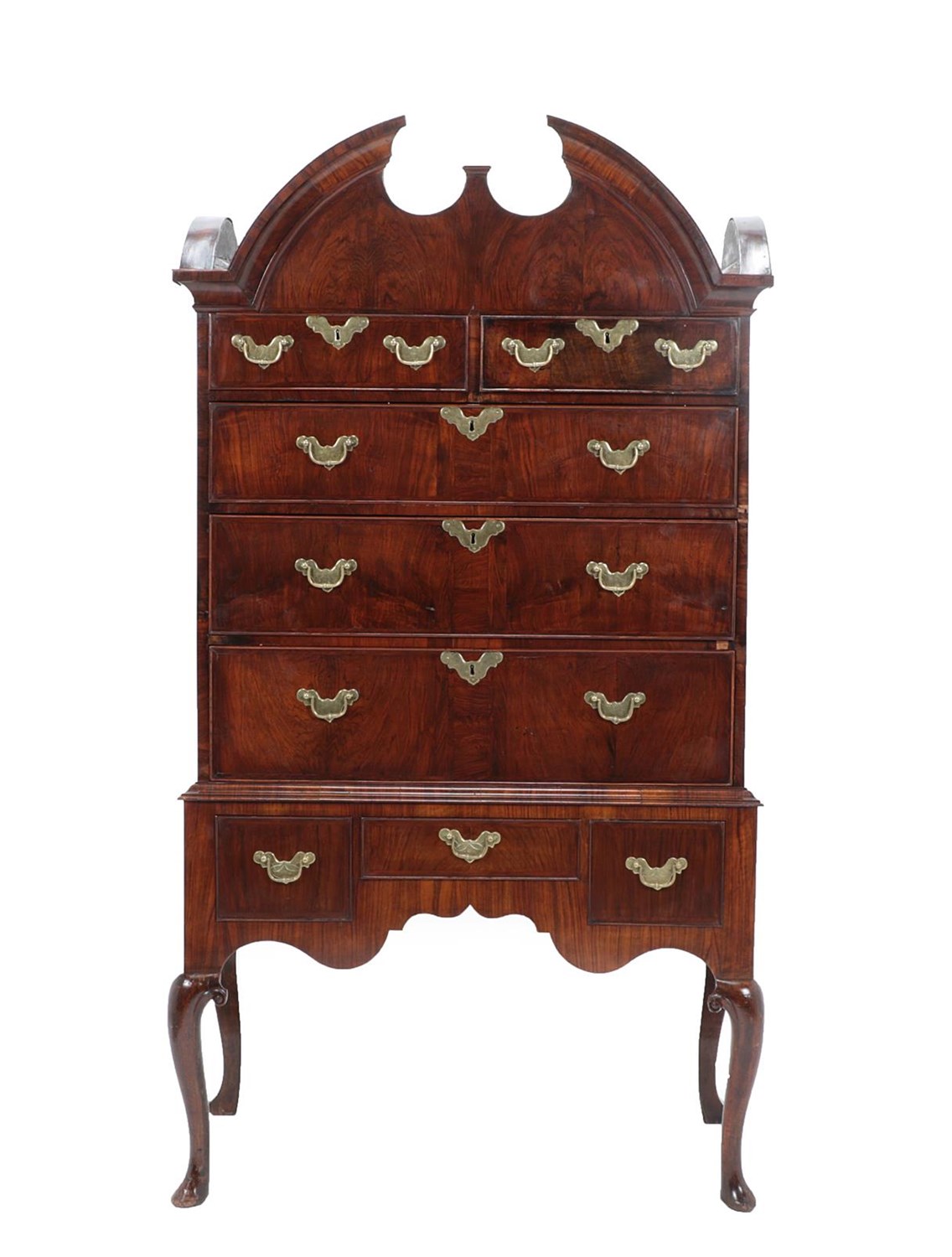 Lot 484 - A Walnut and Featherbanded Chest on Stand, the moulded cornice above two short and three long...