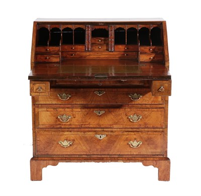 Lot 485 - A George I Walnut, Crossbanded and Barber Pole Strung Bureau, early 18th century, the...