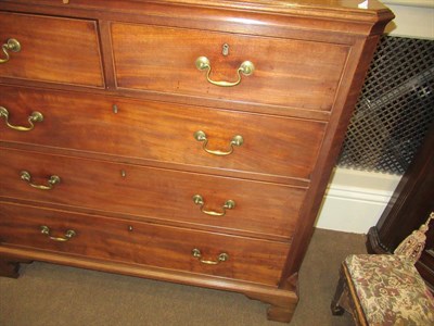 Lot 486 - <> A George III Mahogany Straight Front Chest of Drawers, early 19th century, the moulded top above