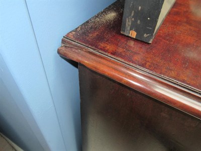 Lot 490 - <> A George III Mahogany Kneehole Desk, early 19th century, the moulded top above one long and...