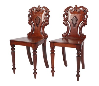 Lot 496 - <> A Pair of Victorian Carved Mahogany Hall Chairs, circa 1870, with acanthus carved and...