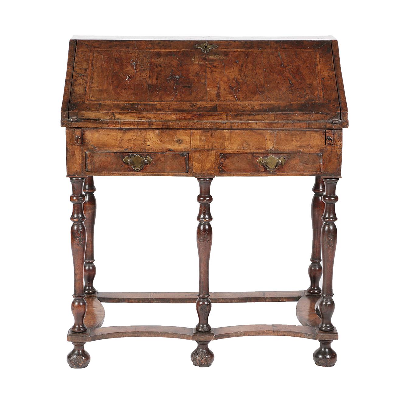 Lot 497 - <> A William & Mary Walnut and Featherbanded Bureau, late 17th century, the fall enclosing a...