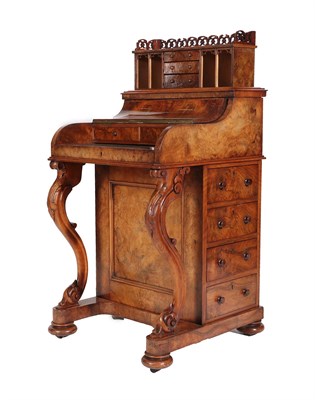 Lot 498 - A Victorian Burr Walnut Piano-Top Davenport, circa 1870, the sprung mechanism with fretwork gallery