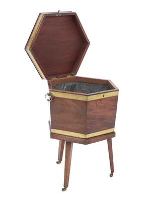 Lot 500 - A George III Mahogany and Brass Bound Hexagonal Shaped Cellaret on Stand, late 18th century,...