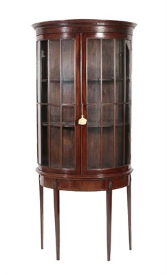 Lot 534 - A Mahogany D Shaped Display Cabinet, with a moulded and dentil cornice above a blind fret...