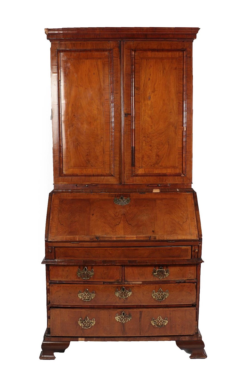 Lot 548 - An Early 18th Century Walnut Bureau Bookcase, the upper section with moulded panel doors...