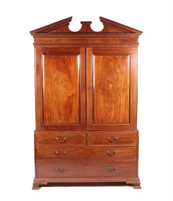 Lot 551 - ~ A George III Mahogany Linen Press, late 18th century, the architectural and dentil cornice...