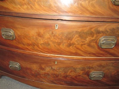 Lot 552 - ~ A Late George III Mahogany Bowfront Chest of Drawers, early 19th century, of two short over three