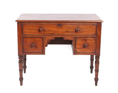 Lot 553 - ~ A Mid 19th Century Washstand, the hinged lid enclosing apertures to receive a wash set above...