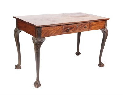 Lot 561 - ~ A George III Style Mahogany Library Table, with single frieze drawer, on acanthus carved cabriole