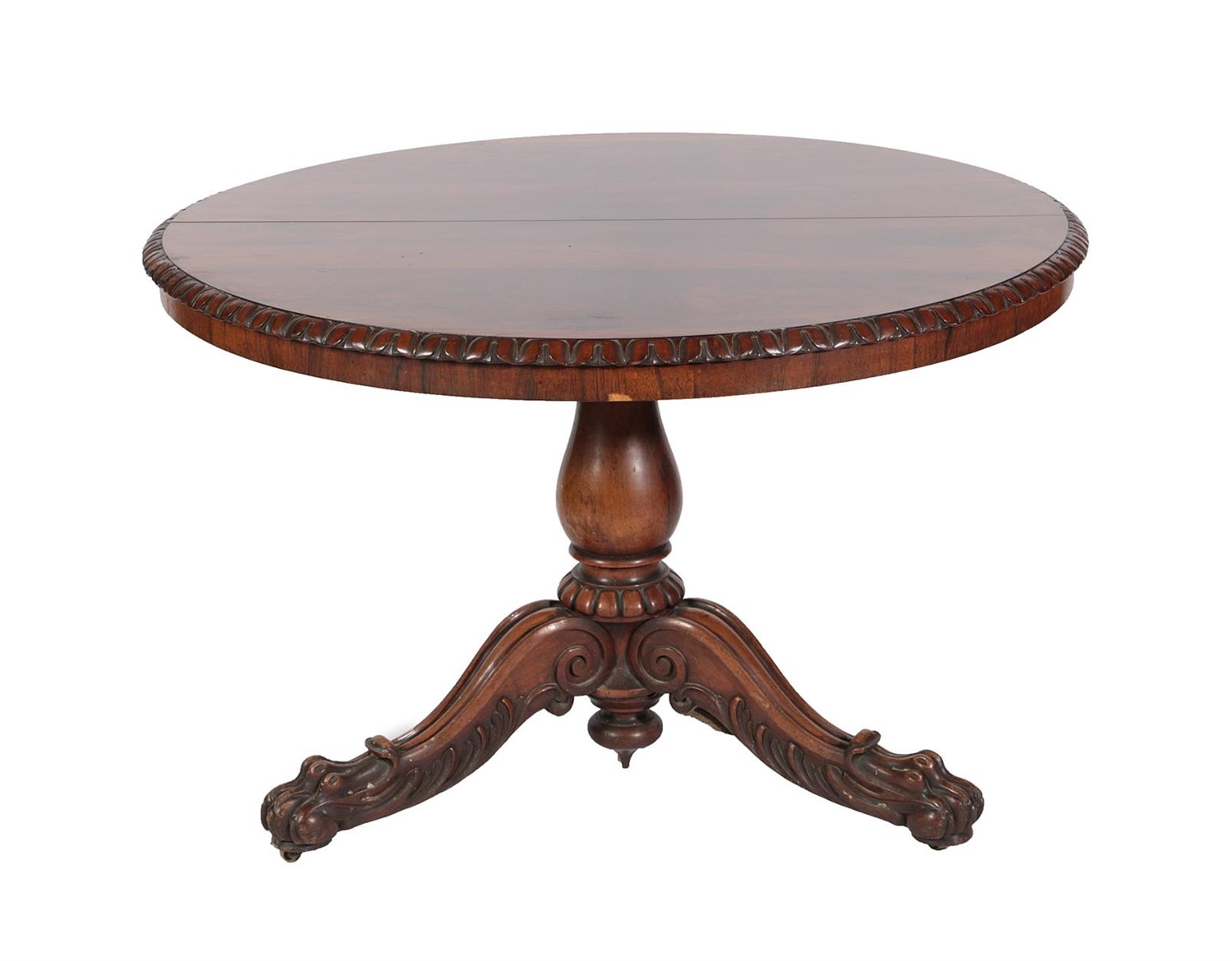 Lot 565 - ~ An Early Victorian Rosewood Circular Fliptop Breakfast Table, the carved border above a...