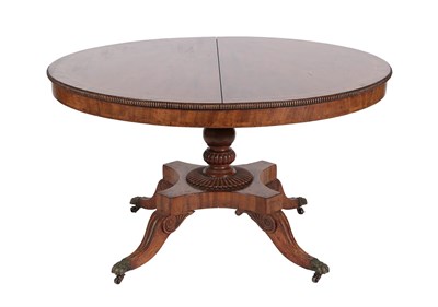 Lot 567 - ~ A George IV Mahogany and Rosewood Crossbanded Circular Fliptop Dining Table, 2nd quarter 19th...