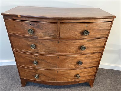 Lot 572 - ~ A Regency Mahogany Bowfront Chest of Drawers, 2nd quarter 19th century, of two short over...