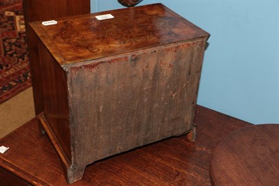 Lot 583 - A George II Style Figured Walnut Miniature Bachelor's Chest, the quarter-veneered and...