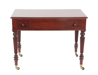 Lot 590 - <> A 19th Century Mahogany Writing Table, in the manner of Gillows, the moulded top above two small