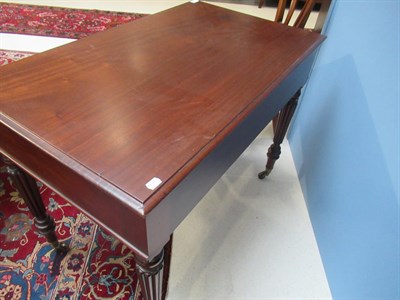Lot 590 - <> A 19th Century Mahogany Writing Table, in the manner of Gillows, the moulded top above two small