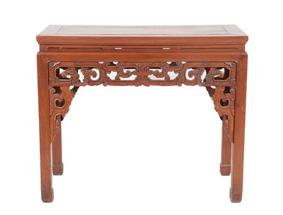 Lot 602 - A Chinese Elm Altar Table, early 20th century, of rectangular form above a carved apron with square