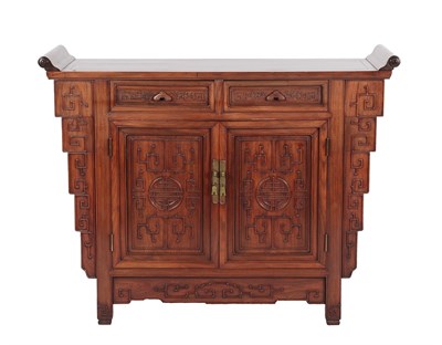 Lot 603 - An Early 20th Century Chinese Hardwood Side Cabinet, the top section with moulded and scrolled...