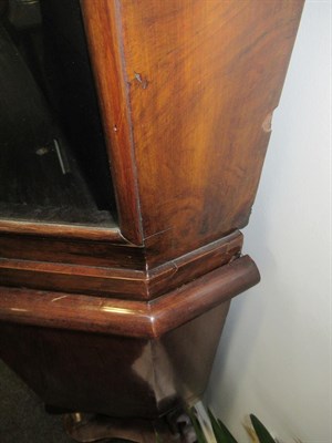 Lot 608 - A Dutch Walnut Display Cabinet, in 17th century style, the moulded top above glazed doors enclosing