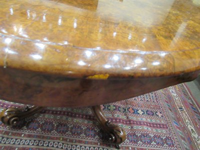 Lot 612 - A Fine Victorian Burr Walnut and Marquetry Inlaid Oval Breakfast Table, circa 1870, the...