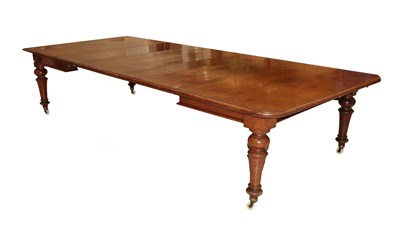 Lot 617 - A Victorian Brown Oak Extending Dining Table, circa 1870, with three original additional...