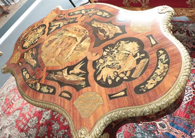 Lot 631 - An Impressive Louis XV Style Marquetry Decorated and Ormolu Mounted Centre Table, the shaped...