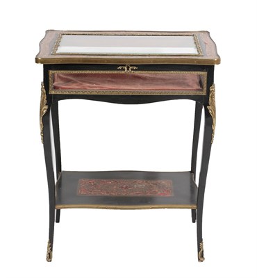 Lot 632 - A French Boulle Style Ebonised Red Tortoiseshell and Ormolu Mounted Bijouterie Table, mid 19th...