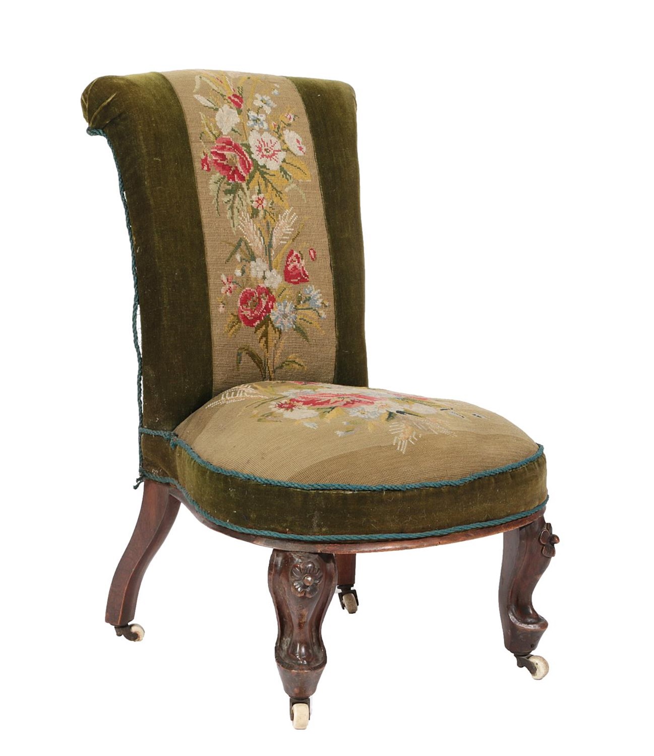 Lot 658 - ~ A Victorian Walnut Nursing Chair, circa 1870, covered in floral needlework and green velvet...