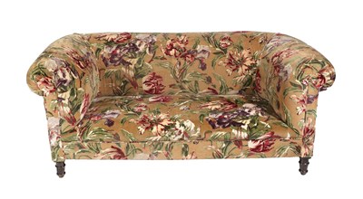 Lot 665 - A Victorian Chesterfield Sofa, late 19th century, recovered in floral fabric, with rounded arm...