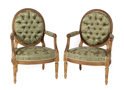 Lot 675 - A Pair of George III Style Giltwood Open Armchairs, late 19th/early 20th century, upholstered...