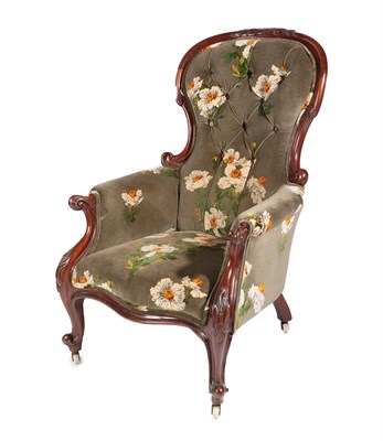 Lot 677 - A Victorian Mahogany Framed Armchair, circa 1870, recovered in buttoned floral fabric, with rounded