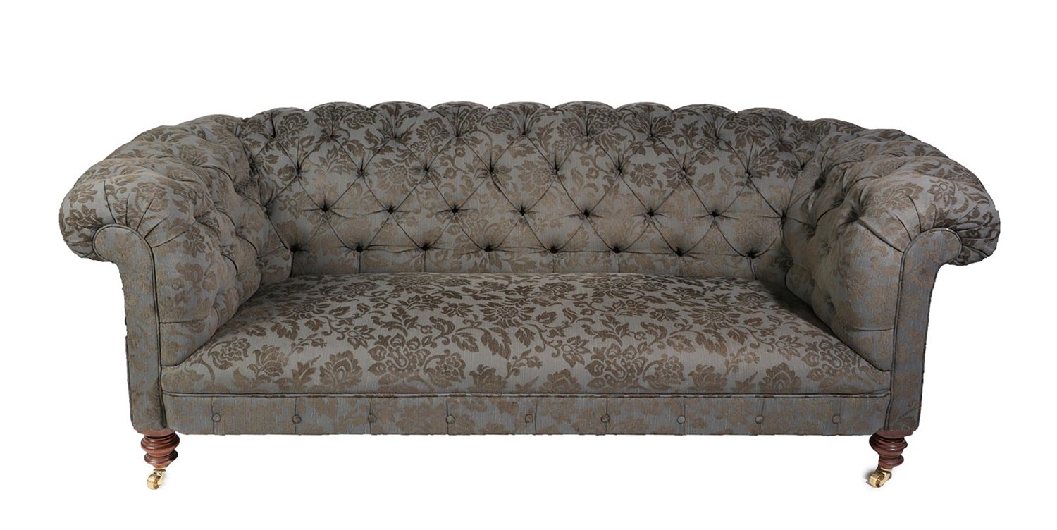 Lot 679 - A Victorian Chesterfield Sofa, late 19th century, recovered in dark blue and floral buttoned...