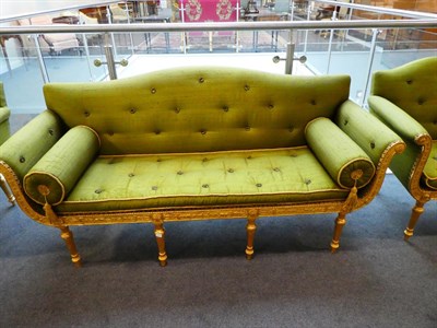 Lot 684 - {} A George III Style Giltwood Suite, late 19th century, upholstered in close-nailed green...