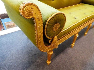 Lot 684 - {} A George III Style Giltwood Suite, late 19th century, upholstered in close-nailed green...