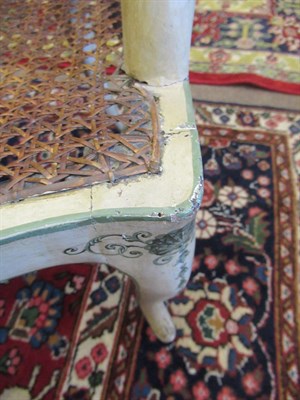 Lot 686 - A George III Polychrome Painted Open Armchair, late 18th century, decorated overall with trails...