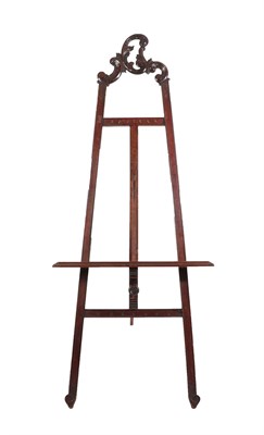 Lot 699 - A French Carved Mahogany Gallery Easel, late 19th/early 20th century, the pierced C scroll and...