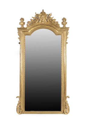 Lot 709 - {} A North European Gilt and Gesso Overmantel Mirror, circa 1870, the later mirror plate within...